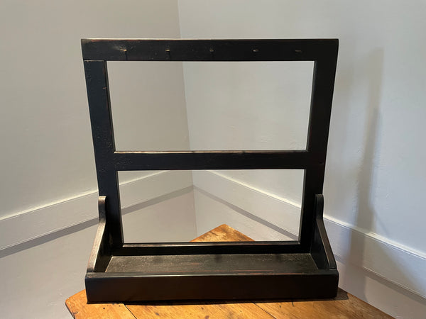 Black Wooden Shelf with Rustic Nails